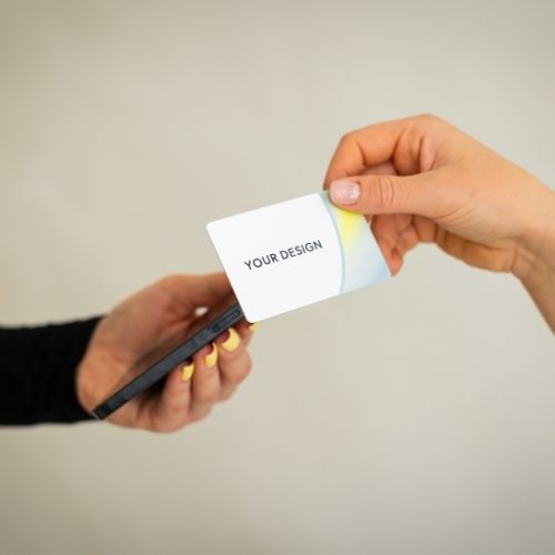 R-PVC Premium Edition NFC business card tapping a mobile phone