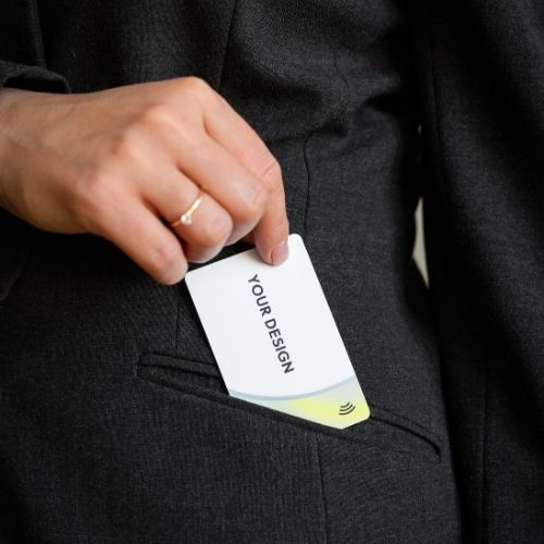 R-PVC Premium Edition NFC business card out of a pocket