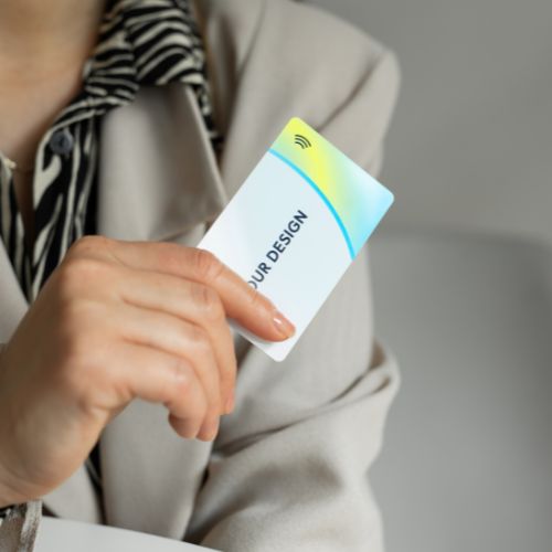 R-PVC Premium Edition NFC business card held by woman